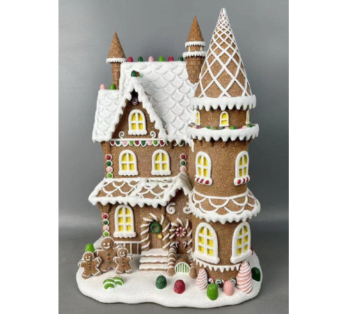 Пряничный замок с LED огнями. 31.5*22.5*40 см.